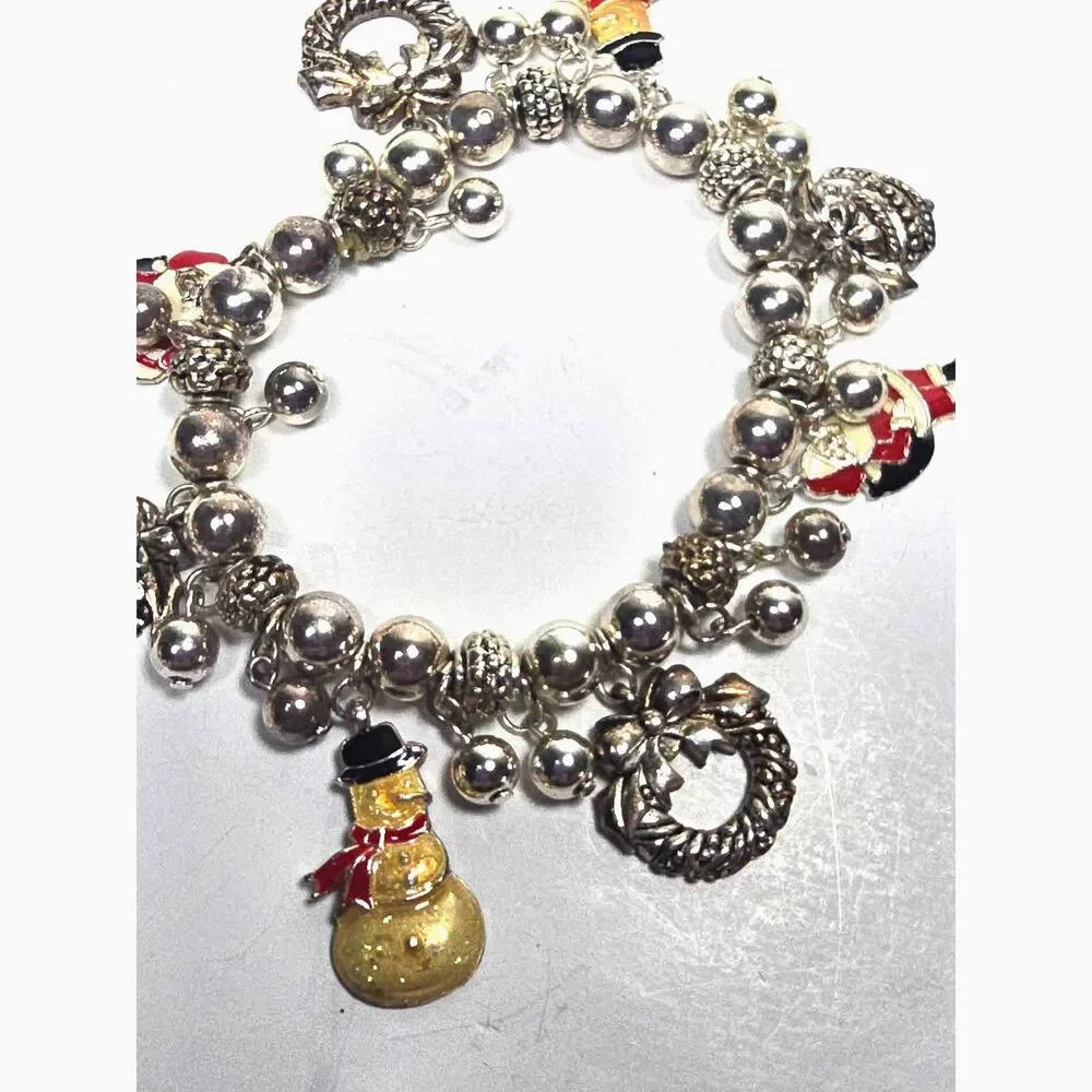 Avon Christmas Charm Bracelet Silver Tone Stretch Santa Snowman Wreath Jewelry